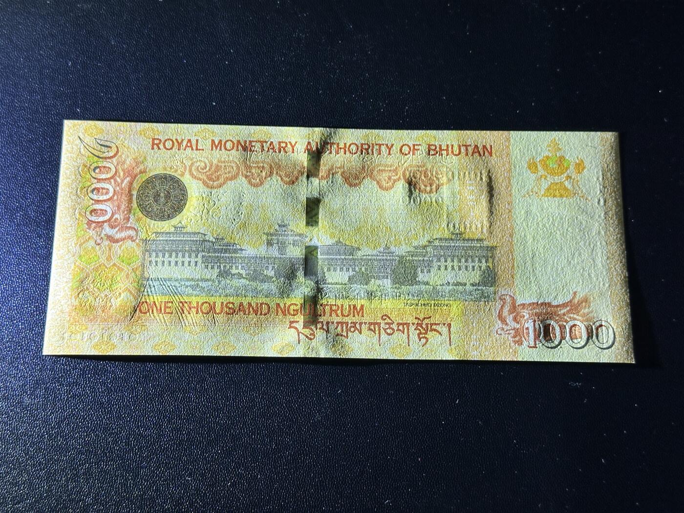 《外钞收藏家》第五百八十六期（品种丰富、精品多）（本平台长期征集拍品、欢迎藏友们联系合作） 2016年不丹1000努尔特鲁姆 全新UNC