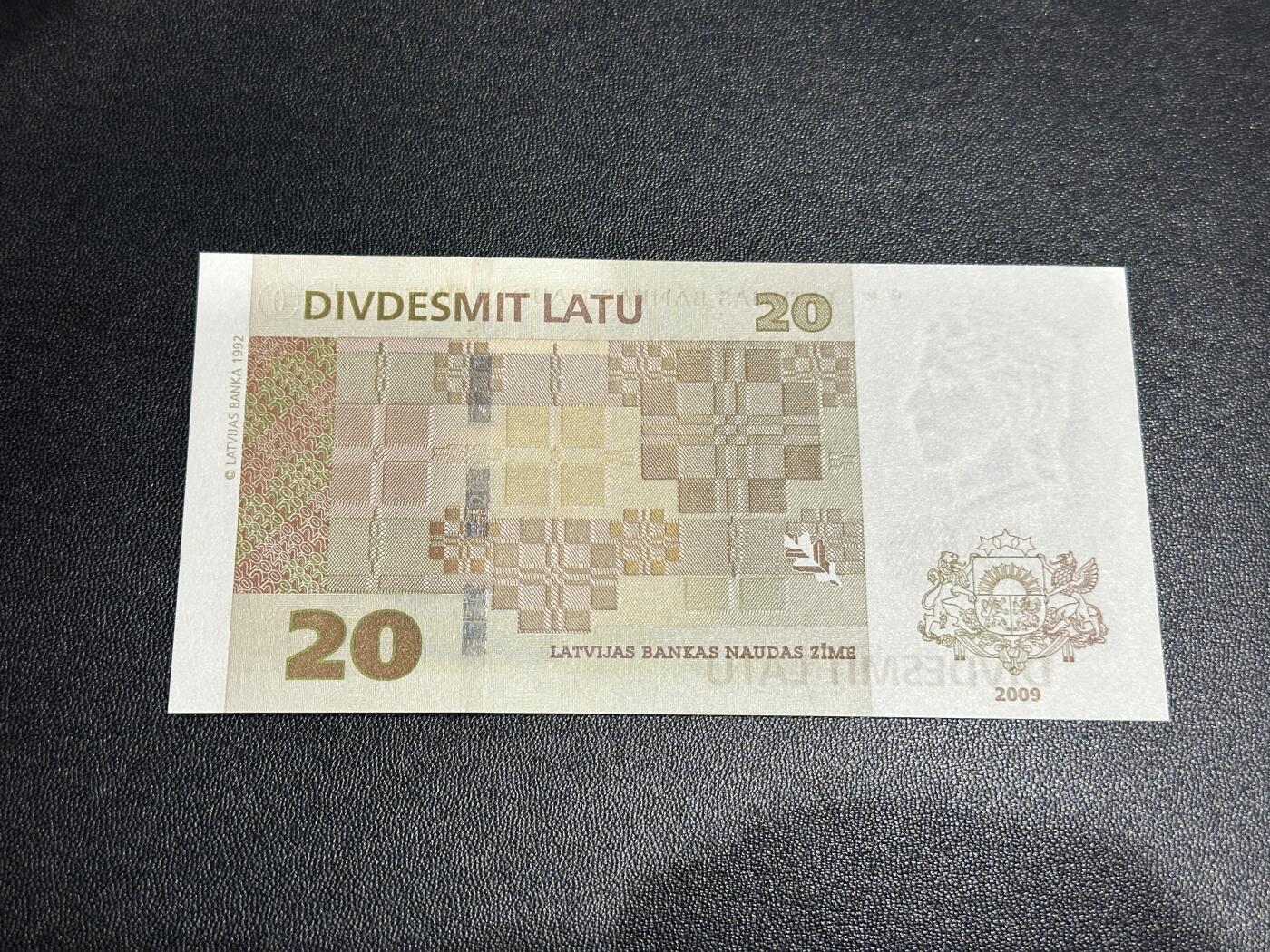 《外钞收藏家》第五百八十六期（品种丰富、精品多）（本平台长期征集拍品、欢迎藏友们联系合作） 2009年拉脱维亚20 A冠 全新UNC