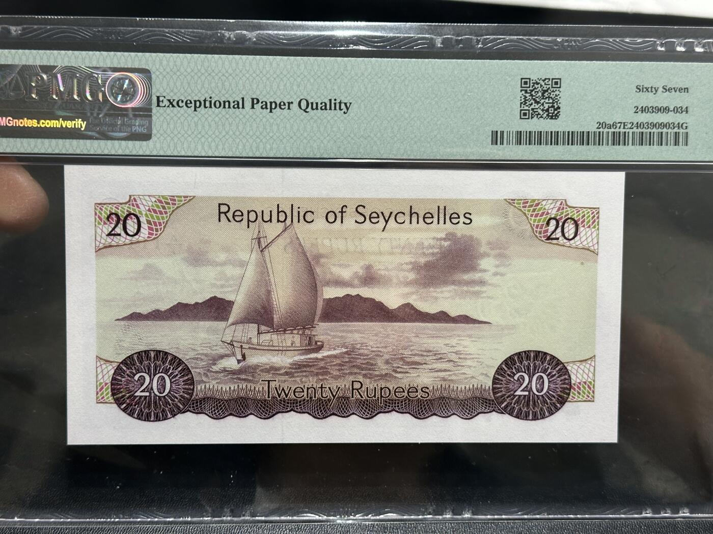 《外钞收藏家》第五百八十六期（品种丰富、精品多）（本平台长期征集拍品、欢迎藏友们联系合作） 1977年塞舌尔20卢比 PMG67 A/1冠 精美风景票面
