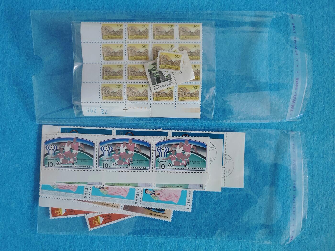 11月18日 🌏全球币章 多品：品相不太好的邮票一堆（第一图）中国邮票未使用 外国邮票已盖销（其中3枚中国单独旧品相邮票是赠送）共50枚