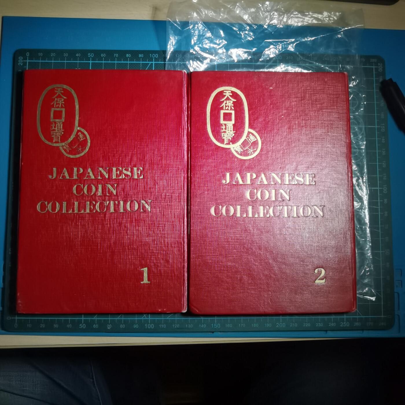 沼泽如烟--第906场 日本册子两本图六吉田和两枚异形花钱看假其它保真