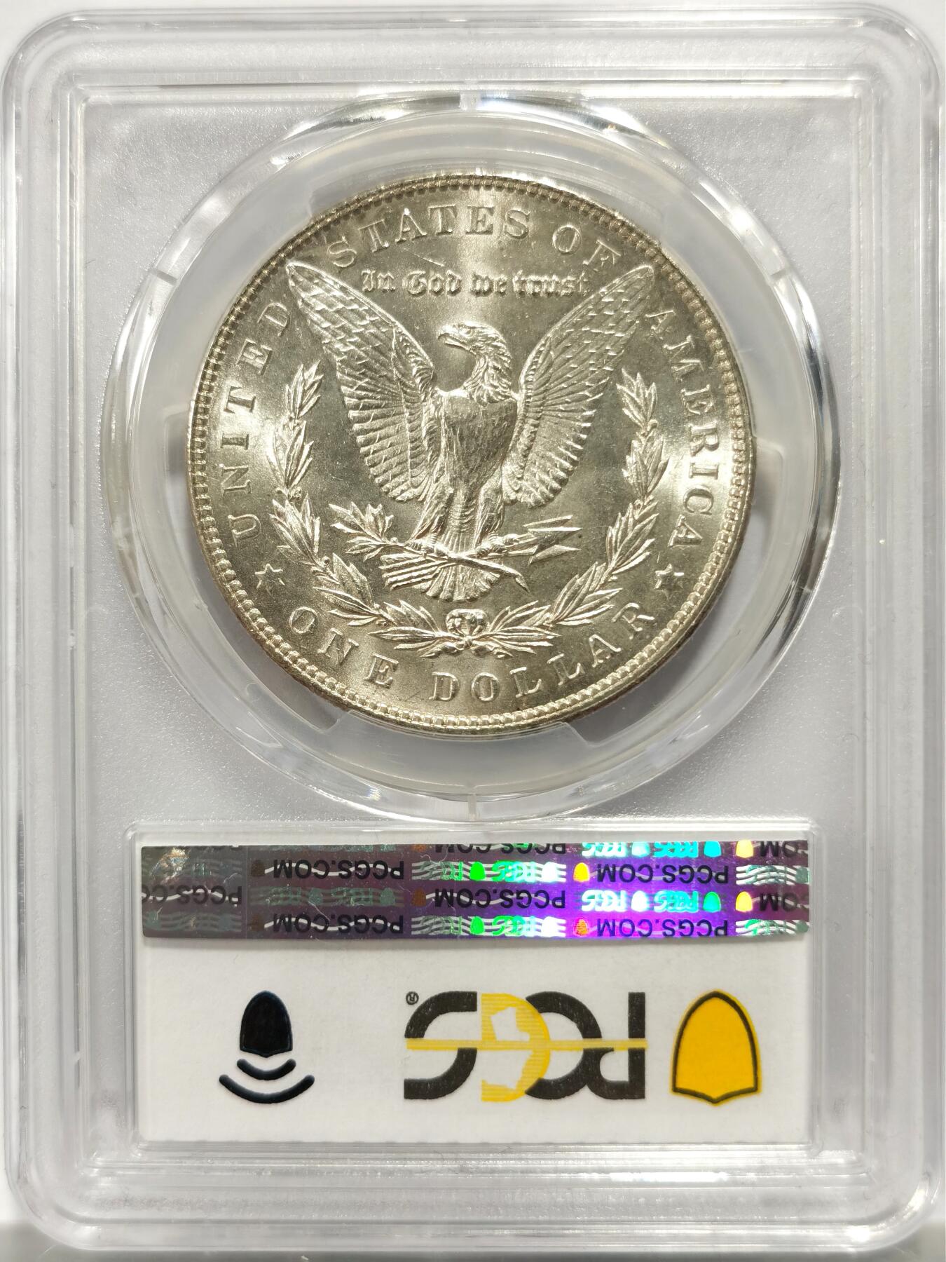 博洋堂藏家专场系列之美国钱币白金之夜专场暨第148期（全场包邮） PCGS MS65 美国1903 摩根 此年绝大多数银币一出厂便直接入库 在《皮特曼法案》的大规模熔毁中 因遵循“后进先出”原则 这些最新入库的1903年银元首当其冲 超过95%的产量在原封币袋中就被销毁 因此这个本应常见的年份 其未流通品相意外地变得极其稀有和珍贵 此枚麦稀奇所见最高分 品相极佳 十字转光 收藏好品