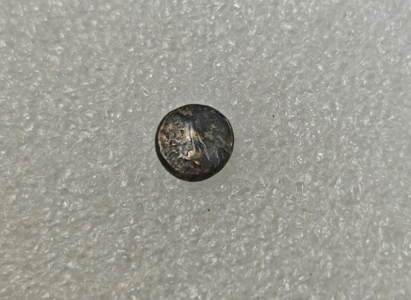 瓶子🏺第217期拍卖会  古希腊卡利亚地区哈利卡纳苏斯城海怪刻托斯银币 公元前500-前495年卡利亚地区首府哈利卡纳苏斯城发行 正面是龙形海怪刻托斯的头像 背面是网格形花饰中的大芒星 哈利卡纳苏斯，卡利亚地区首府，今天的土耳其博德鲁姆，古代世界七大奇迹之一的摩索拉斯王陵所在地