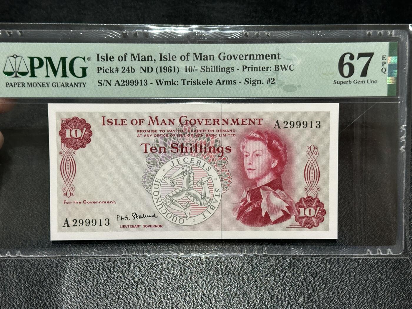 《外钞收藏家》第五百八十六期（品种丰富、精品多）（本平台长期征集拍品、欢迎藏友们联系合作） 1961年马恩群岛10先令 A冠 无47 PMG67 精品女王 BWC版