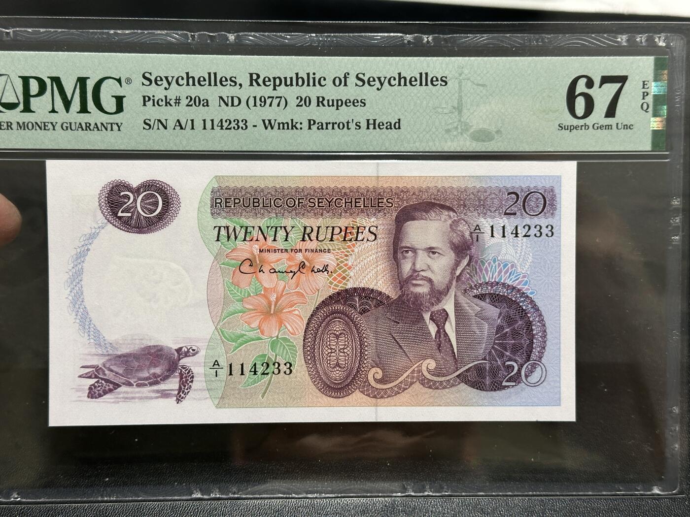 《外钞收藏家》第五百八十六期（品种丰富、精品多）（本平台长期征集拍品、欢迎藏友们联系合作） 1977年塞舌尔20卢比 PMG67 A/1冠 精美风景票面