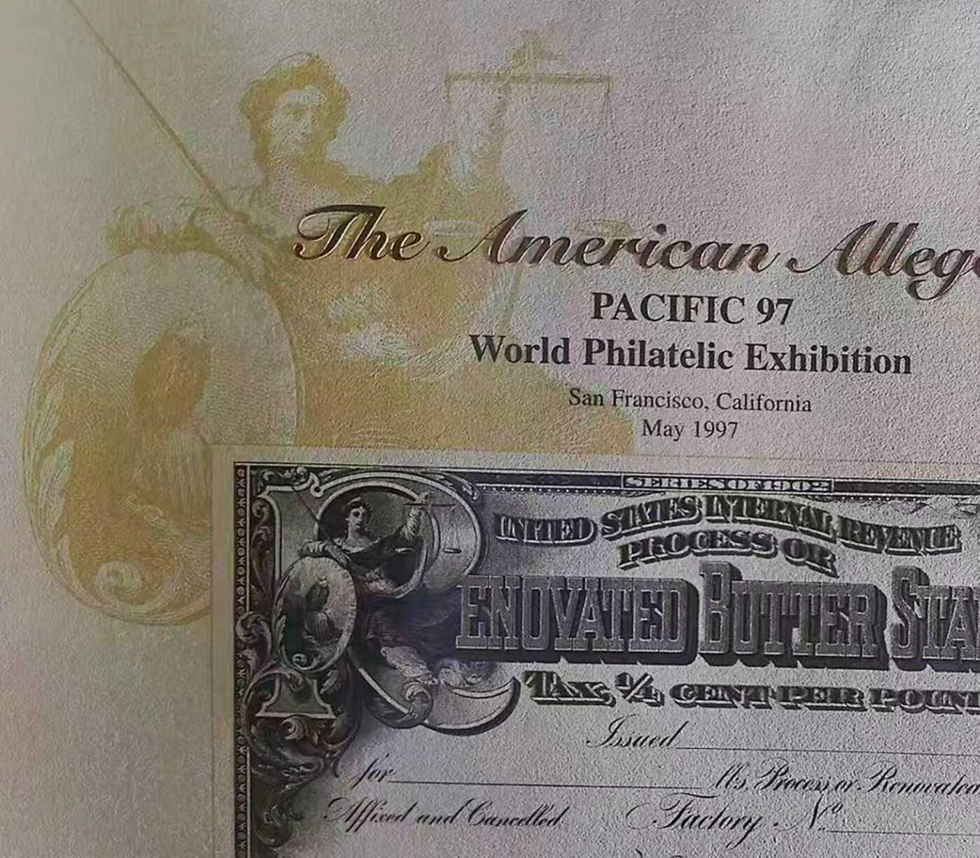 《外钞收藏家》第五百八十六期（品种丰富、精品多）（本平台长期征集拍品、欢迎藏友们联系合作） 1997年 美国铸印局（ BEP） 加工黄油税票（Renovated Butter）纪念卡 原版票据1902年间由美国国税局（United States Internal Revenue）颁布使用 该雕刻版税票纪念卡为百年原票母版印制（非普通平面印刷） 并限量发行 加贴1996年32美分邮票以及纪念戳 乃高价原版老票据收藏欣赏之平替
