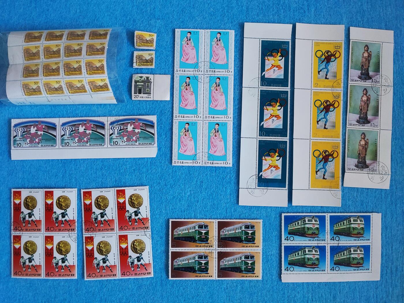 11月18日 🌏全球币章 多品：品相不太好的邮票一堆（第一图）中国邮票未使用 外国邮票已盖销（其中3枚中国单独旧品相邮票是赠送）共50枚