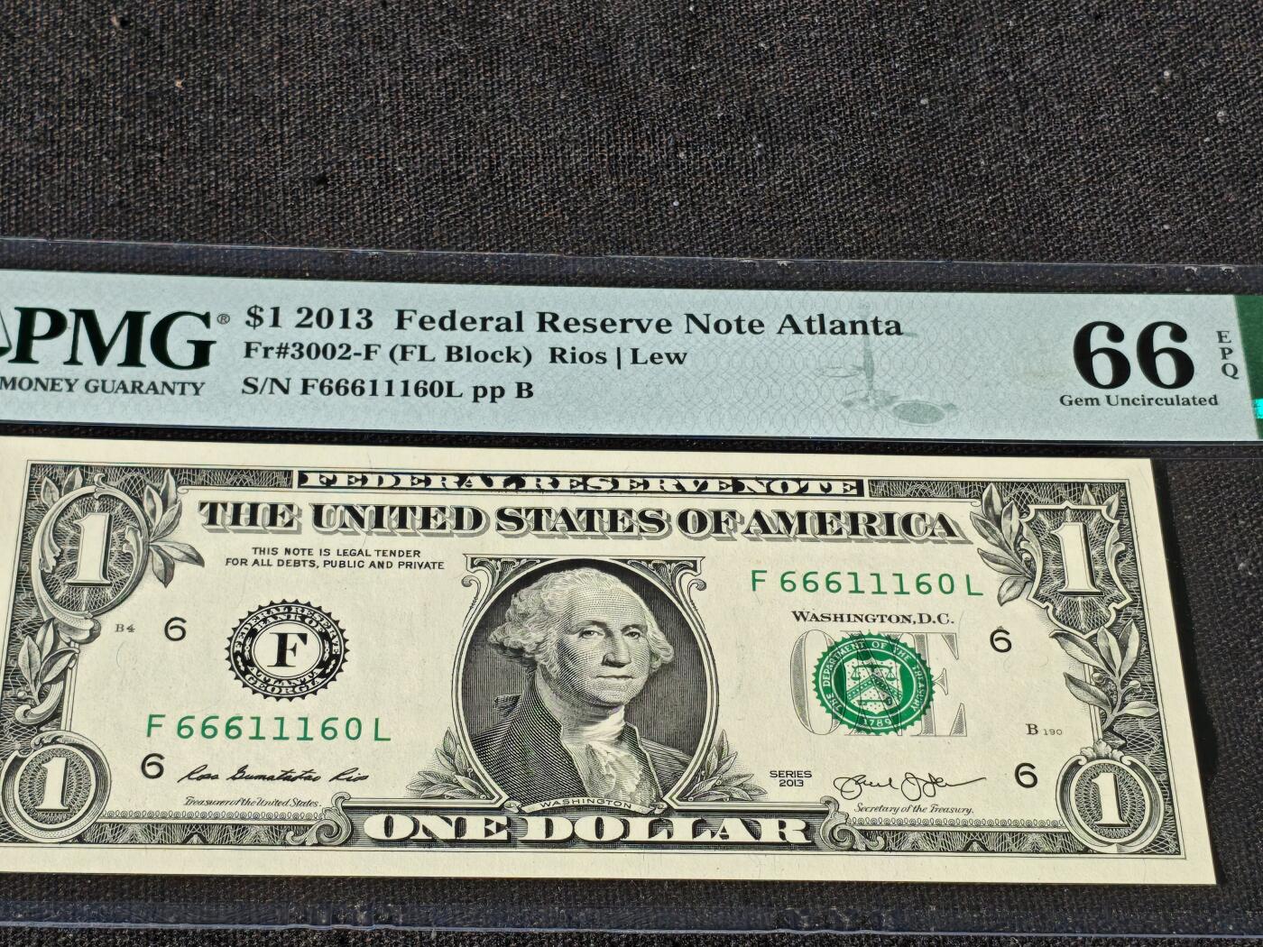 刘世昌艺术品销售中心～虎踞龙蟠*金杨在线联拍群第510期 美国2013年1美元【倒置号】【数3】【双豹子头】（PMG    66E    号码：F66611160L）1枚。