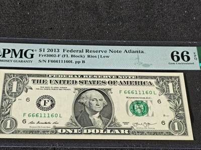 刘世昌艺术品销售中心～虎踞龙蟠*金杨在线联拍群第510期 - 美国2013年1美元【倒置号】【数3】【双豹子头】（PMG    66E    号码：F66611160L）1枚。