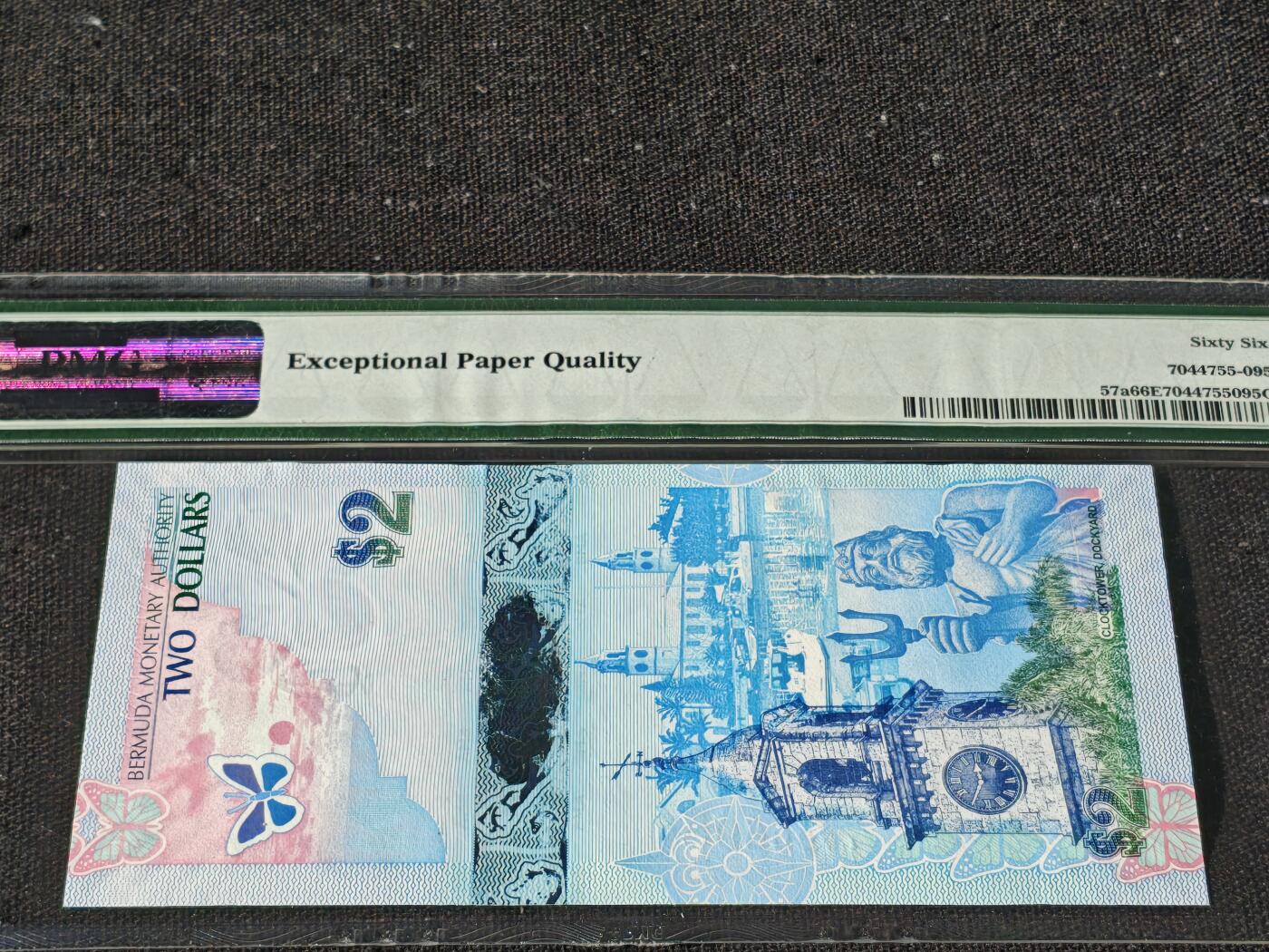 刘世昌艺术品销售中心～虎踞龙蟠*金杨在线联拍群第510期 百慕大2009年2元（PMG 66E 号码：A/1 780695）1枚。此币荣获当年IBNS世界纸币大奖赛“最佳纸币”大奖。