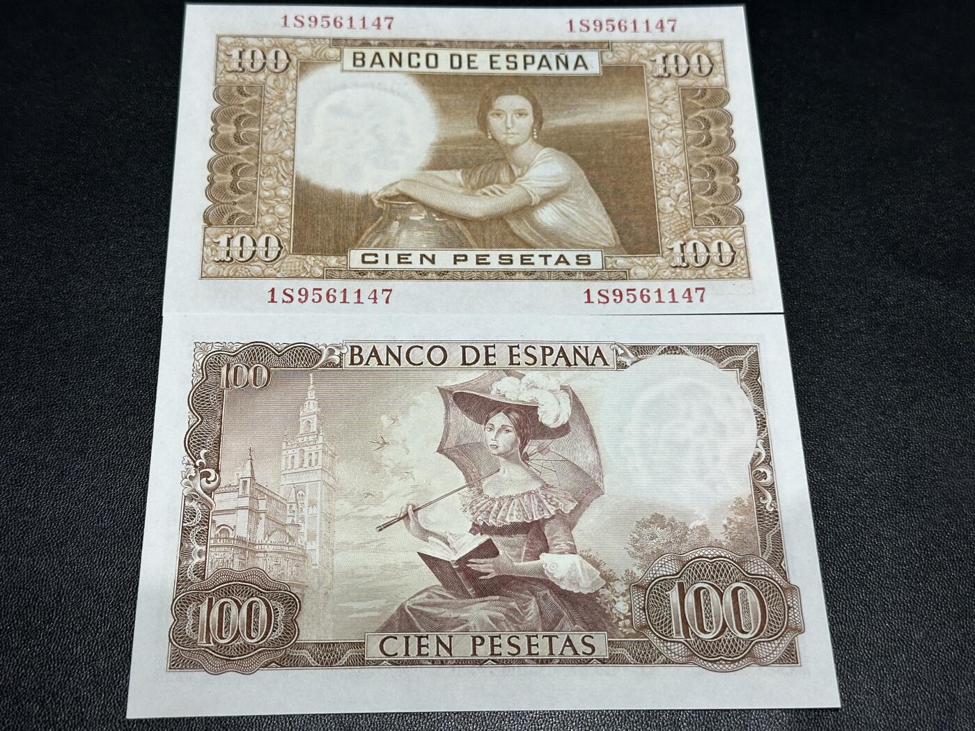 《外钞收藏家》第五百八十六期（品种丰富、精品多）（本平台长期征集拍品、欢迎藏友们联系合作） 1953和65年西班牙100比塞塔 2张一起 全新UNC