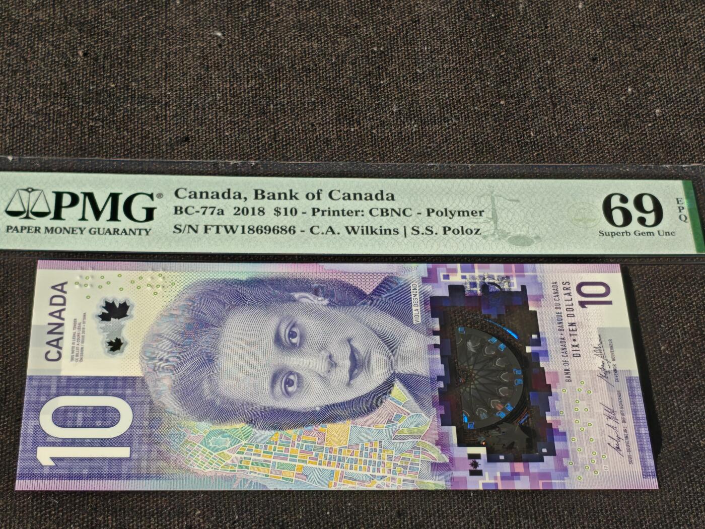 刘世昌艺术品销售中心～虎踞龙蟠*金杨在线联拍群第510期 加拿大2018年10元【倒置号】【首发冠】（PMG 69E 号码：FTW 1869686）1枚。此钞荣获当年IBNS世界纸币大奖赛“最佳纸币”大奖。