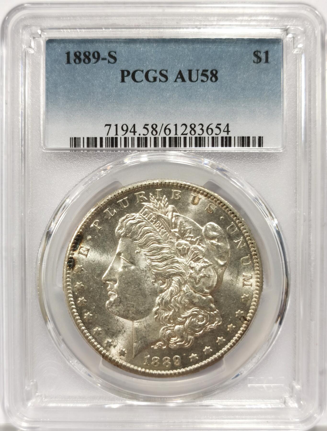 博洋堂藏家专场系列之美国钱币白金之夜专场暨第148期（全场包邮） PCGS AU58 美国1889 S 摩根 铸造量极低（700,000）的关键年 麦稀奇首见稀有版别 严重低评 铸打深俊 币面银光闪耀 点状彩虹包浆点缀 不可多得的收藏佳品