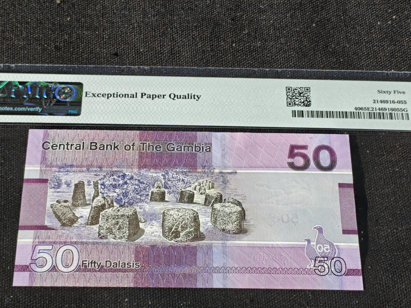 刘世昌艺术品销售中心～虎踞龙蟠*金杨在线联拍群第510期 冈比亚2019年50达拉西（PMG 65E 号码：A1164799）1枚。