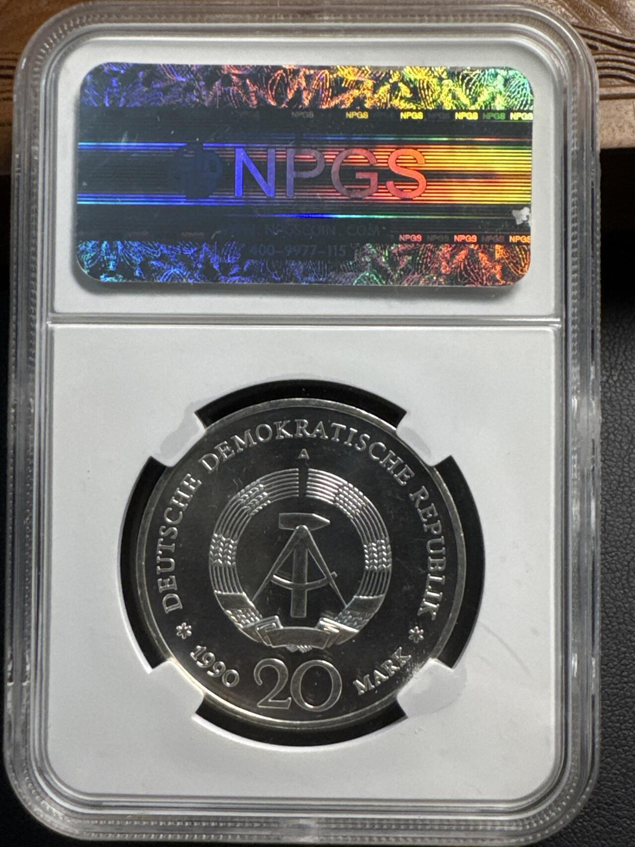 ❤️【币观天下】❤️ 第331期钱币拍卖- 2025.11.21周五晚上6点半场-长期征集拍品 【获奖币】民主德国东德1990年勃兰登堡门重新开放NPGS众诚评级封装纪念银币999银18.2克直径33毫米