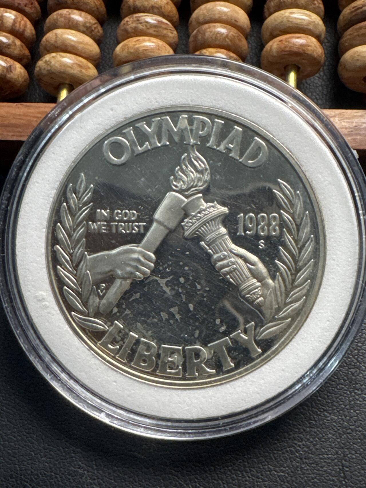 ❤️【币观天下】❤️ 第331期钱币拍卖- 2025.11.21周五晚上6点半场-长期征集拍品 美国奥运会纪念币1988年1美元银币火炬