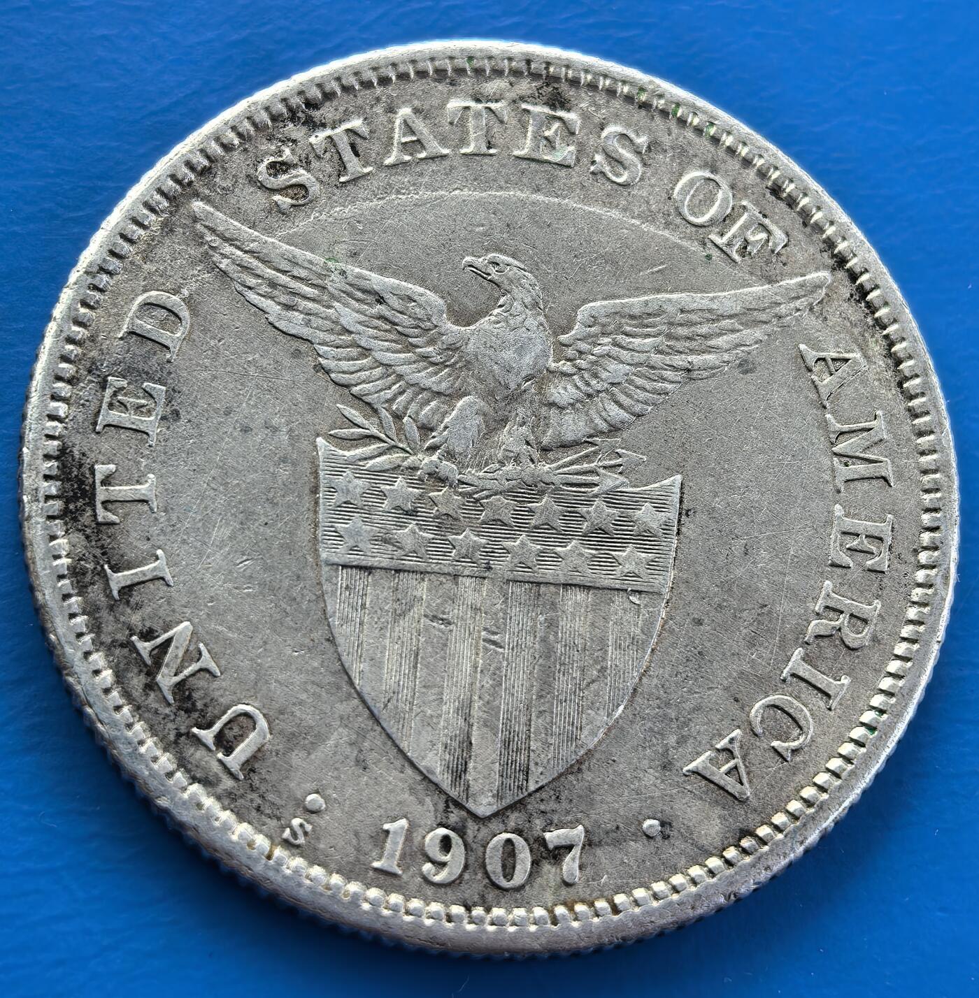 外国优质老铜币银币，周六九点倒数截拍，满百包邮，可寄存半年，喜欢朋友微信扫描二维码可直接参拍 美占菲律宾1907年打铁女神壹元大银币