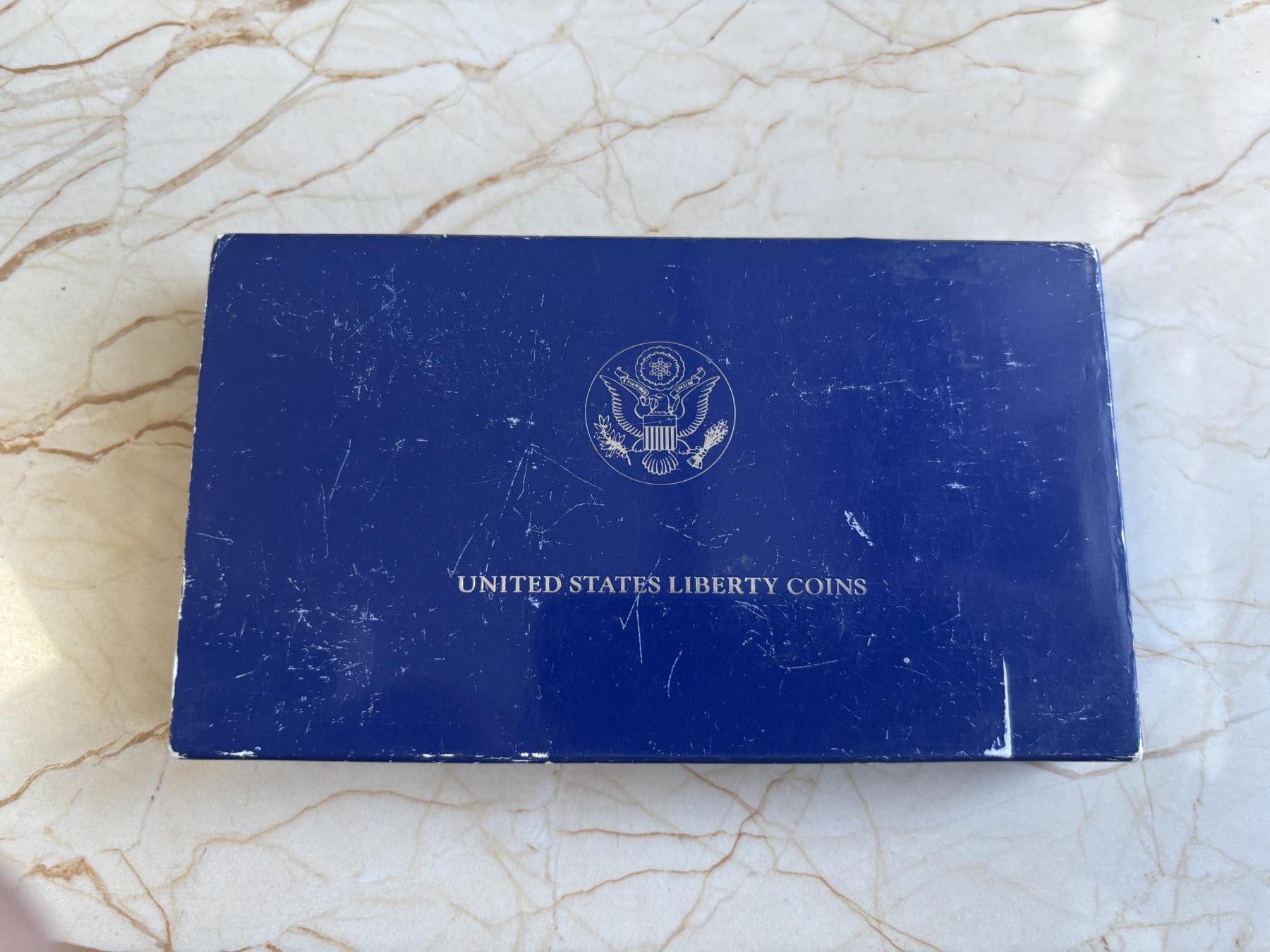 第182期拍卖 1986年美国双币套 自由女神纪念银币和铜镍币（1美元+半美元） 26.73克900银 盒证全