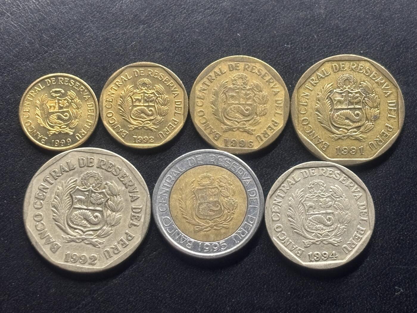 邮泉阁限时拍卖第三十六场 美洲硬币专场（硬币在国外。请付邮费6元。） 秘鲁1990年代7枚盲文版