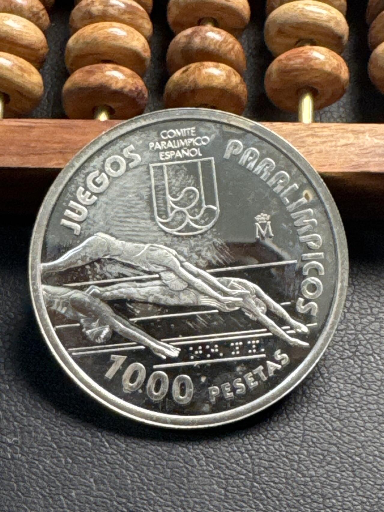 ❤️【币观天下】❤️ 第331期钱币拍卖- 2025.11.21周五晚上6点半场-长期征集拍品 西班牙1996年1000比塞塔奥运纪念银币