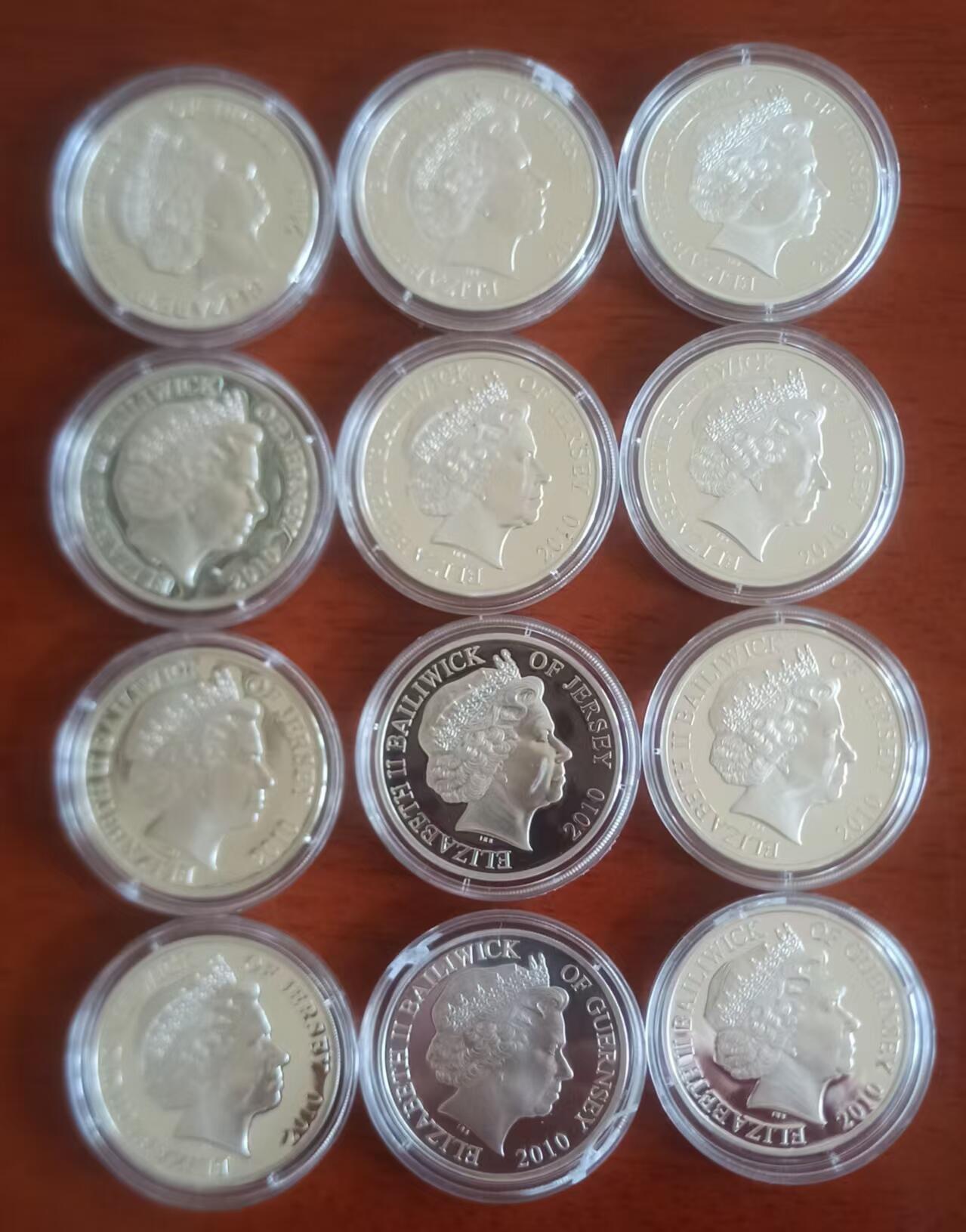 ❤️【币观天下】❤️ 第331期钱币拍卖- 2025.11.21周五晚上6点半场-长期征集拍品 根西、泽西不列颠空战纪念克朗银币12枚 包含10枚人物和两枚飞机彩色克朗大银币 人物包括丘吉尔、道丁、以及巴德爵士在内的王牌飞行员。飞机为格洛斯特斗士和布伦斯特战机 飞机欠证书一张