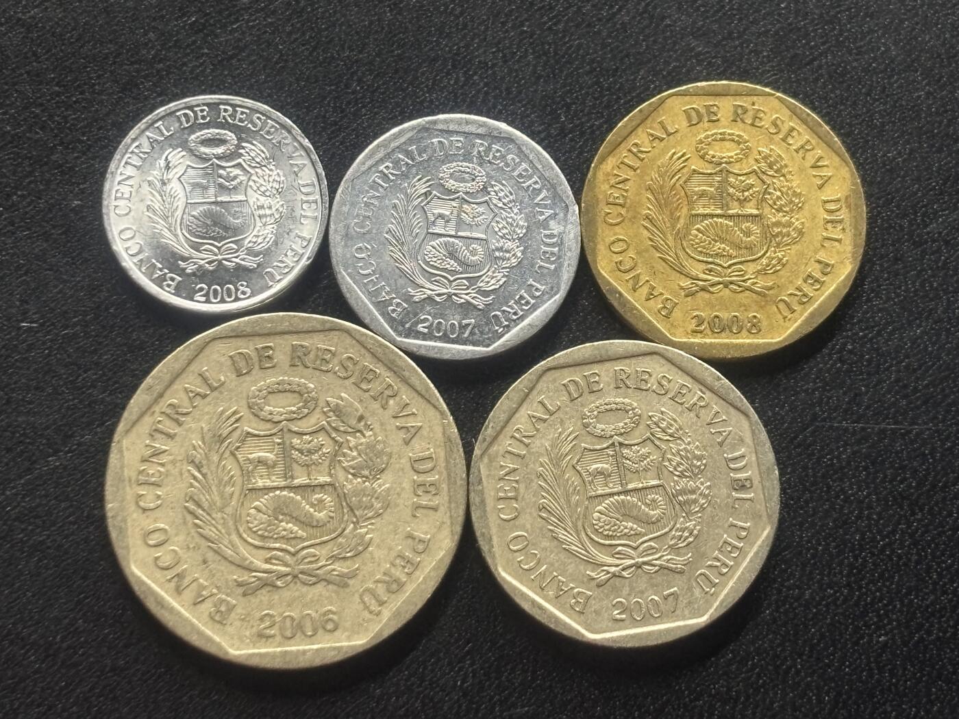 邮泉阁限时拍卖第三十六场 美洲硬币专场（硬币在国外。请付邮费6元。）