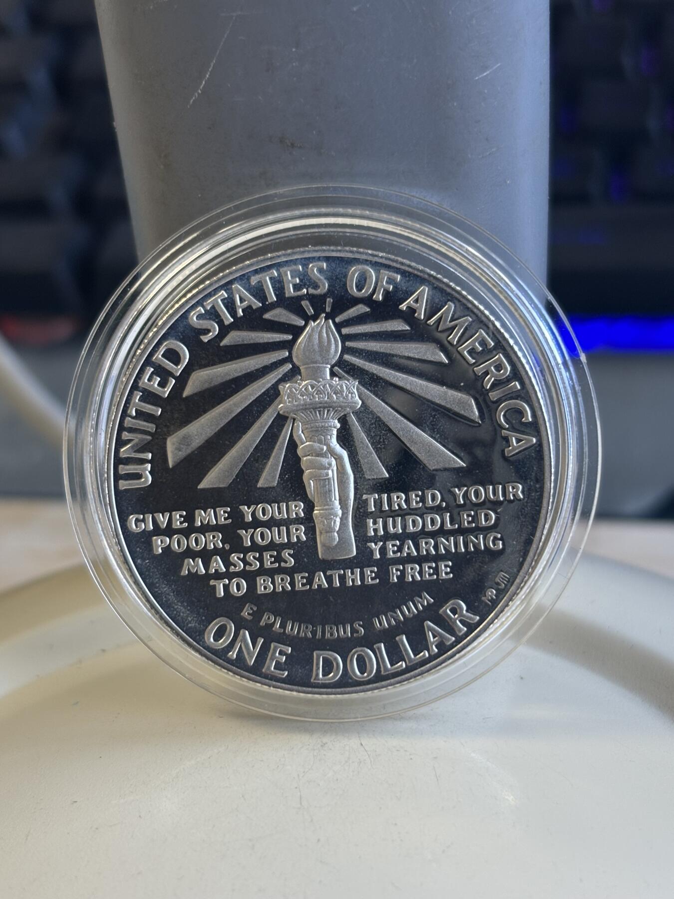 第182期拍卖 1986年美国双币套 自由女神纪念银币和铜镍币（1美元+半美元） 26.73克900银 盒证全