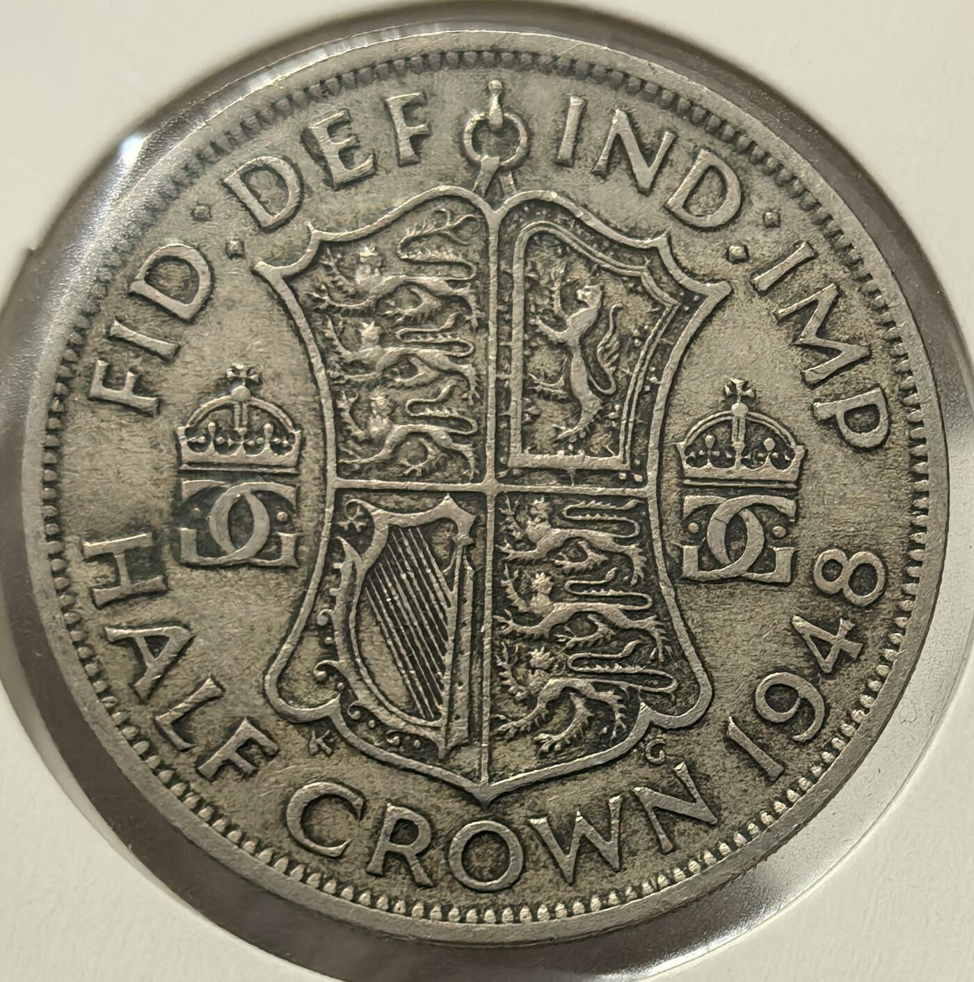 外国优质老铜币银币，周六九点倒数截拍，满百包邮，可寄存半年，喜欢朋友微信扫描二维码可直接参拍 英国1948年半克朗