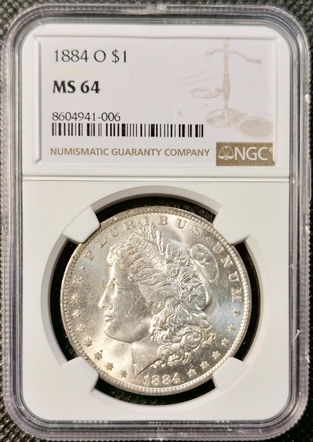 甄臻铺-世界币章拍卖（第40期）送拍享返佣金等优惠多多 NGC-MS64 1884年美国O版摩根，正面币面干净，背面淡淡月芽儿包浆