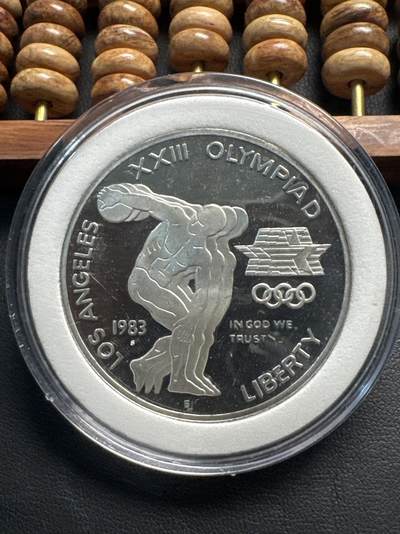 ❤️【币观天下】❤️ 第331期钱币拍卖- 2025.11.21周五晚上6点半场-长期征集拍品 - 美国1988奥运会纪念币1美元银币铁饼