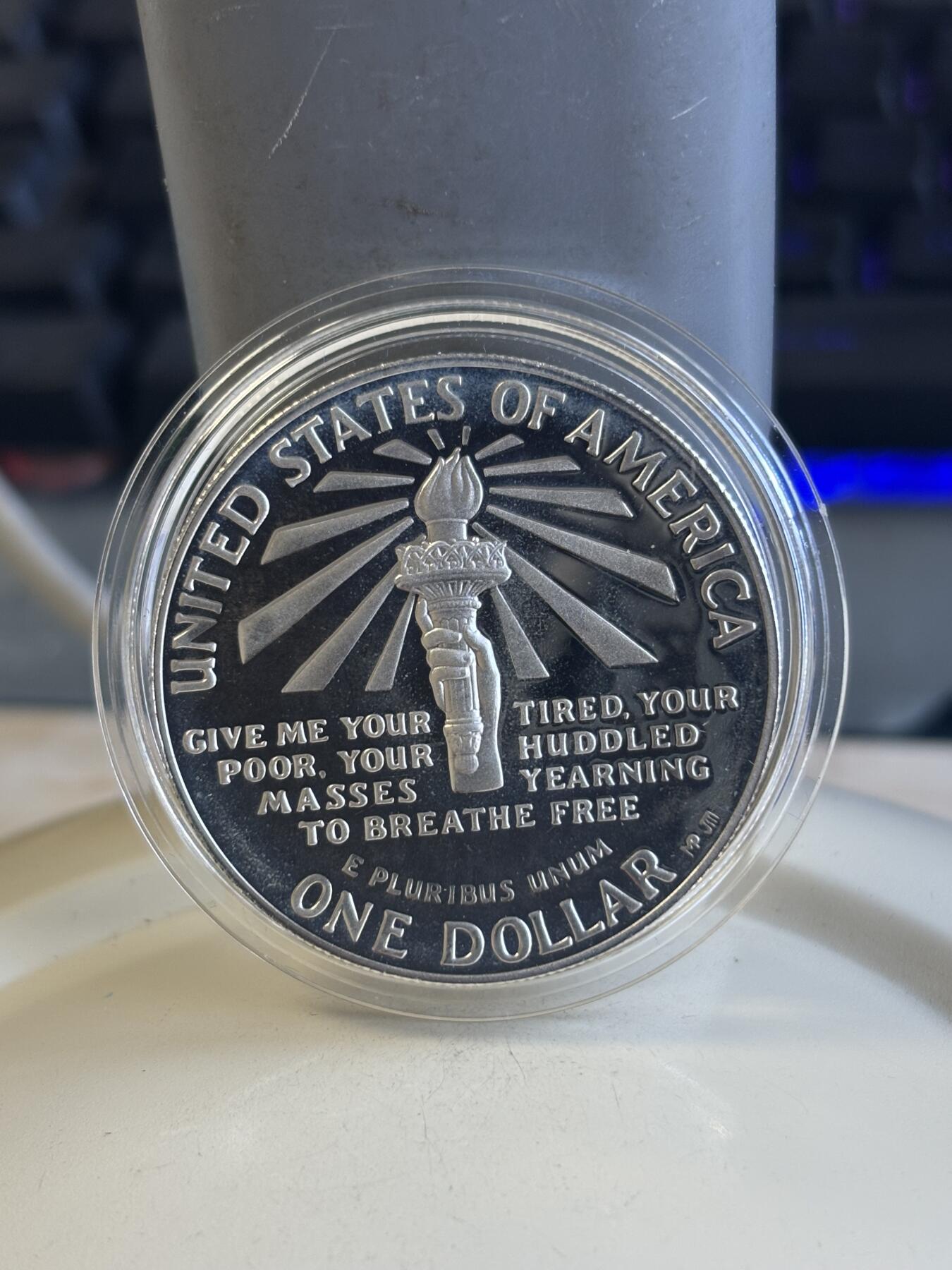 第182期拍卖 1986年美国双币套 自由女神纪念银币和铜镍币（1美元+半美元） 26.73克900银 盒证全