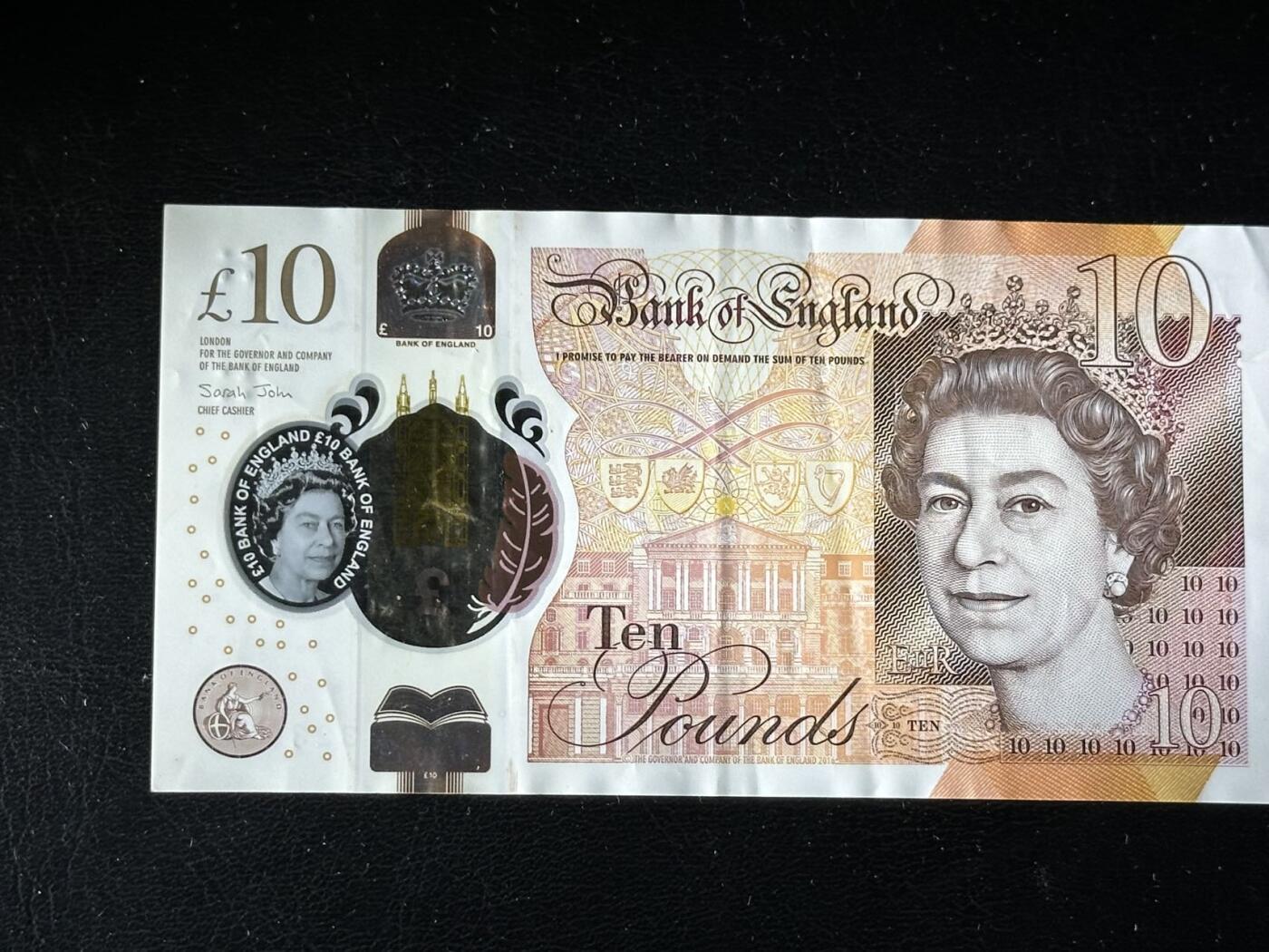 九十场（大更新） 英国10镑，塑料钞！999豹子号，无47。流通美品