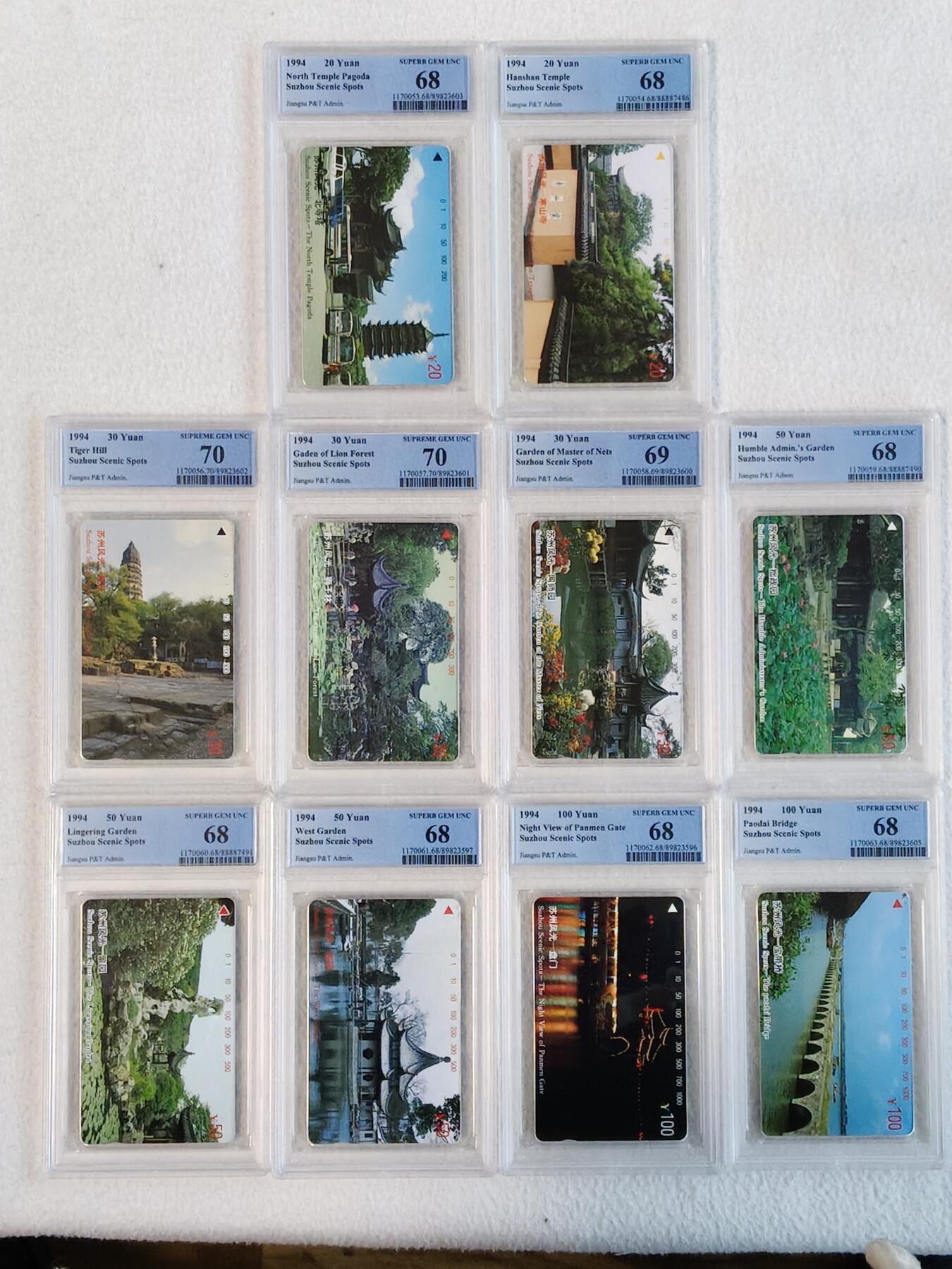 易卡拍卖第59期 苏州十景。（精品热门地方卡，风光系列）PCGS评级70——68分（70分的两枚分别是10——3，10——4。69分的一枚为10——5。其余的7枚都是68分）。如图所示！