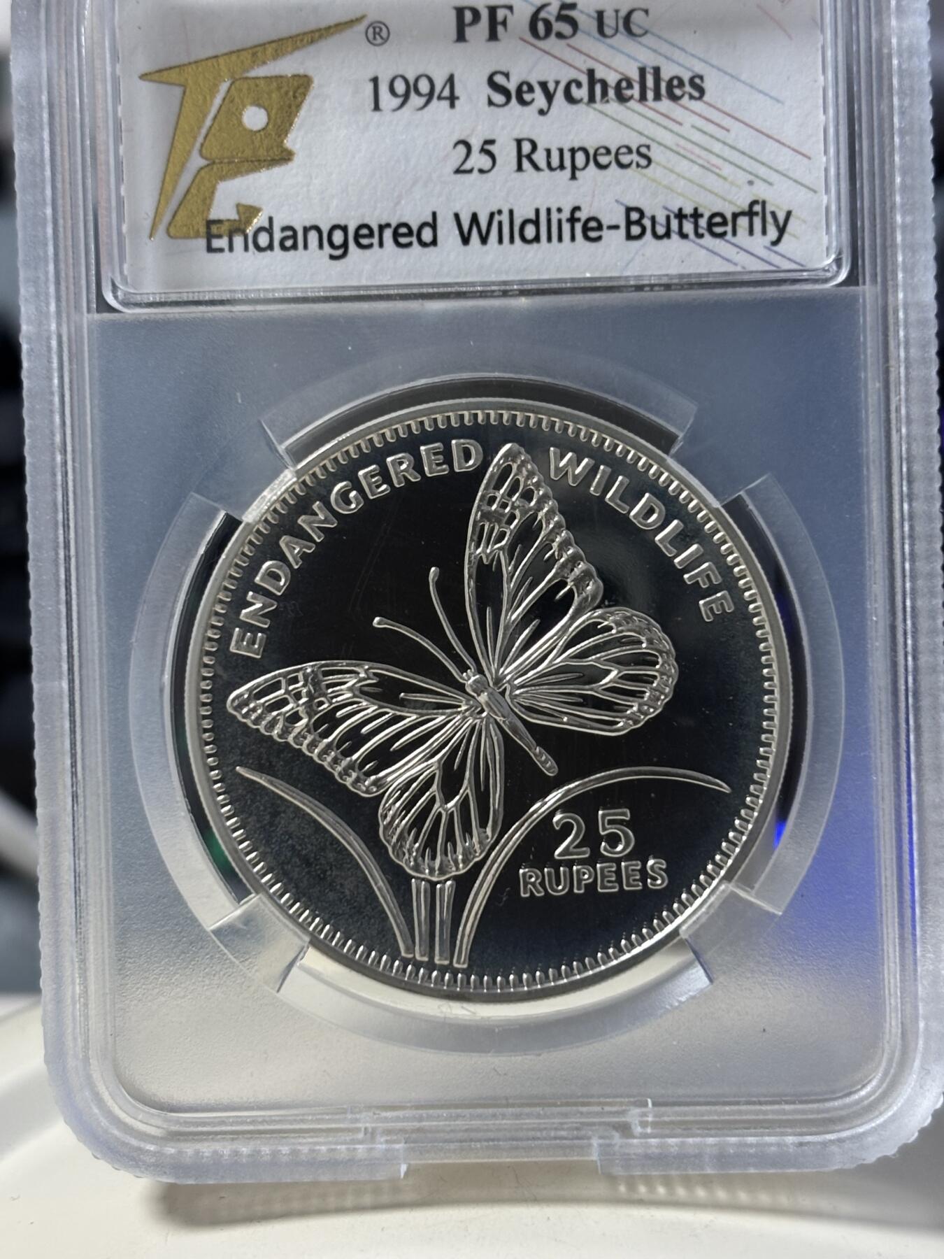 第182期拍卖 塞舌尔1994年珍稀动物系列蝴蝶纪念银币TQG-PF65，925银，28.28克