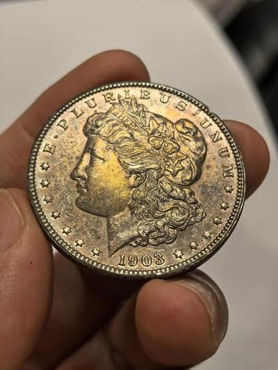博洋堂世界钱币拍卖第147期（全场包邮） - 美国1903年摩根银币，五彩带转光，底板丝滑擦丝少，UNC美品，61、62分品相