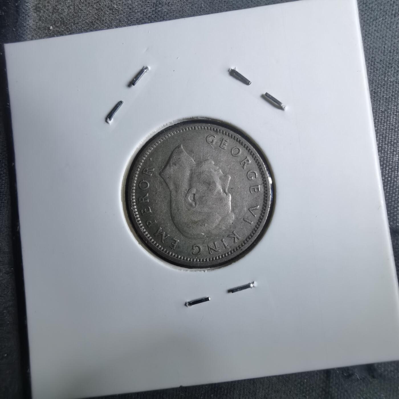 沼泽如烟--第910场 新西兰1943年6便士银币