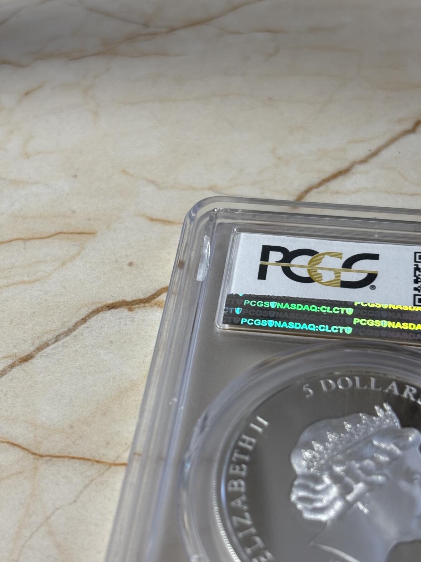 第182期拍卖 库克2017电影蜘蛛侠回归1盎司银币PCGS-PR69，999银，发行5000枚，评级盒有3个破口
