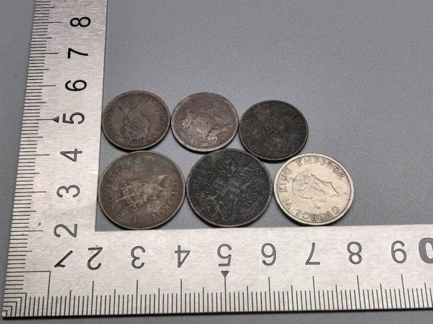 小驴勋章奖章收藏11月22日周六晚六点拍卖（珍爱和平，收藏战争，铭记历史，勿忘国耻，忠党爱国。有偿代拍，送拍规则在简介最后，参拍须阅读规则后再参拍，关系到运费包装发货时效真假辨别等关键信息，拍卖时不再发原图，看大图店主微信码在拍卖店铺介绍里） 印度安娜、卢比硬币一组