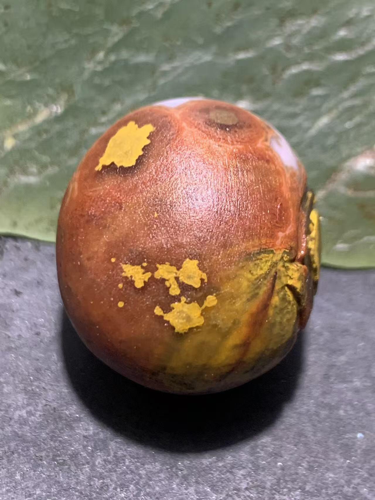 精美亚光高玉化战国红玛瑙雕刻天眼图案随形圆珠一个！