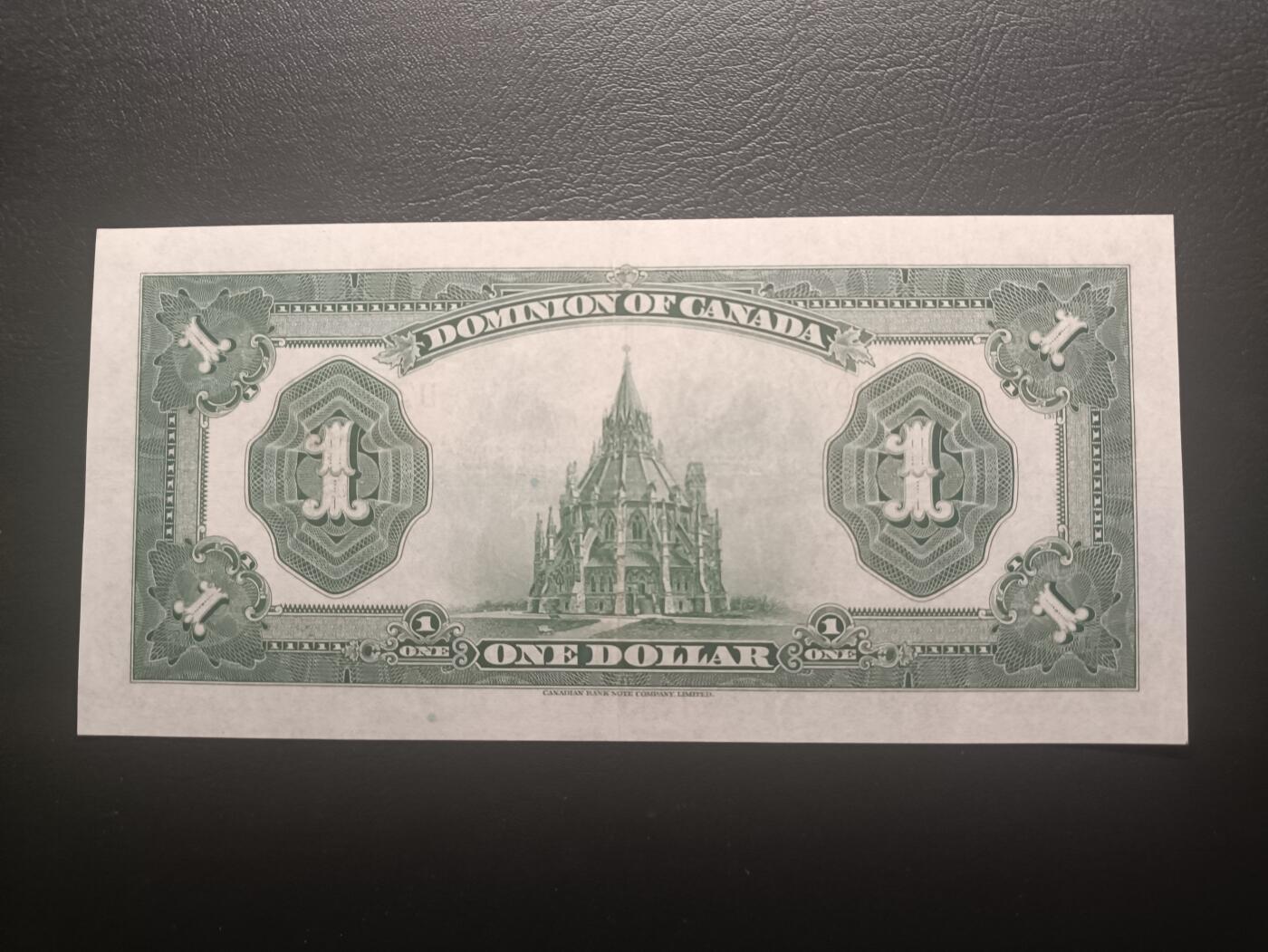 2025十一月第五期，总第203期 加拿大1923版1元流通好品XF，乔治五世国王和渥太华的议会大楼图书馆