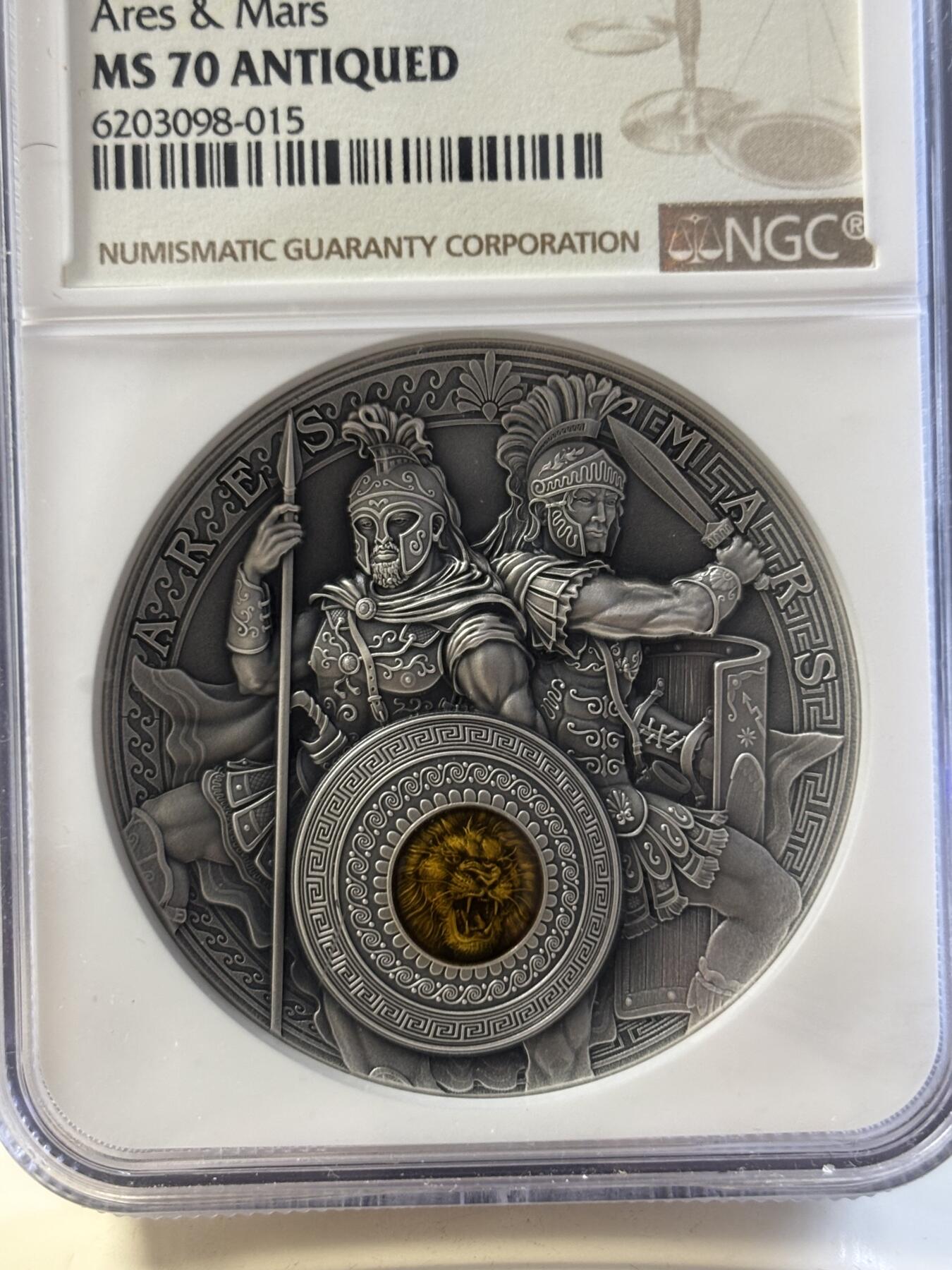 第182期拍卖 纽埃2021年战神阿瑞斯和马尔斯2盎司高浮雕镶嵌纪念银币NGC-MS70原盒证书，999银，发行量500枚，
