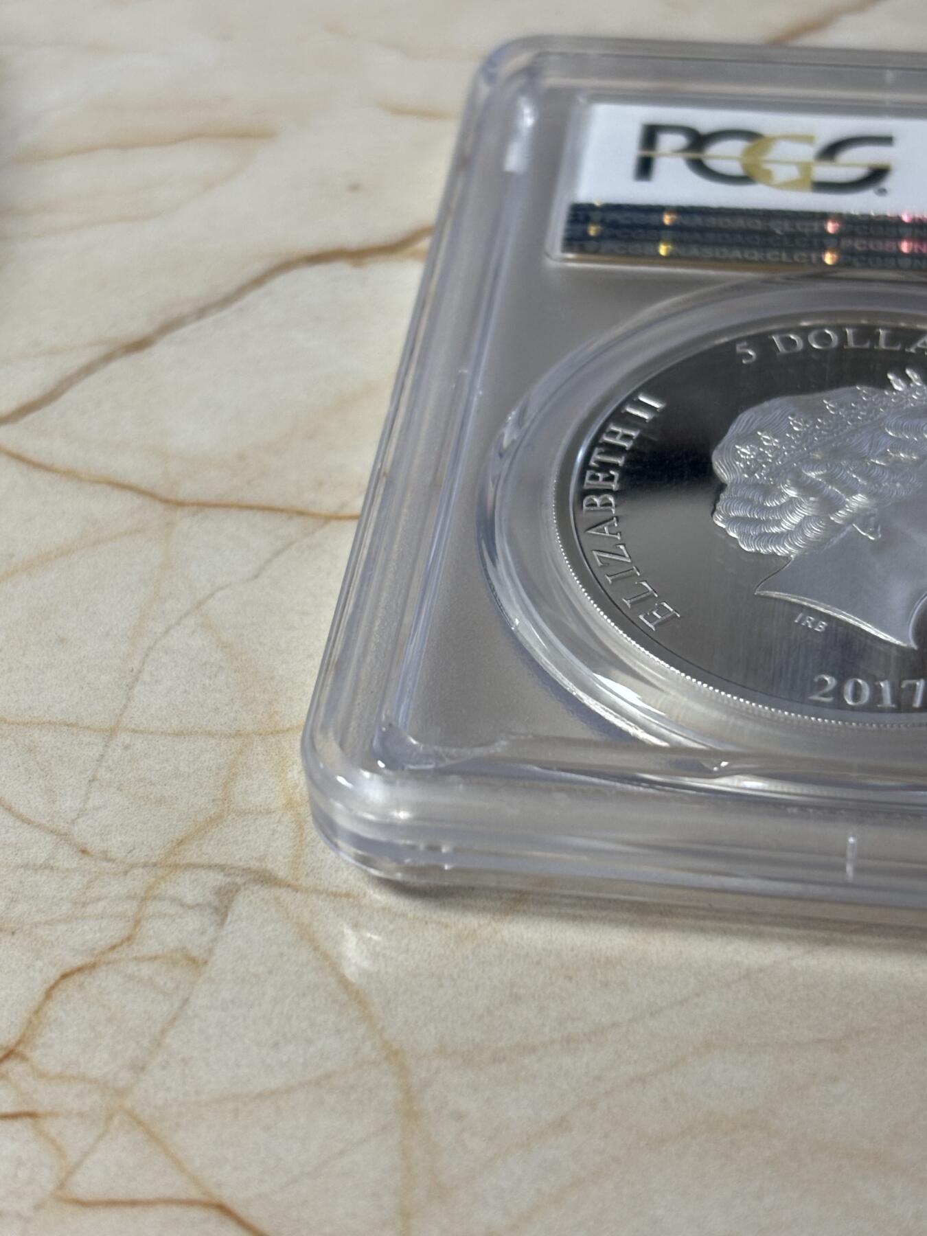 第182期拍卖 库克2017电影蜘蛛侠回归1盎司银币PCGS-PR69，999银，发行5000枚，评级盒有3个破口