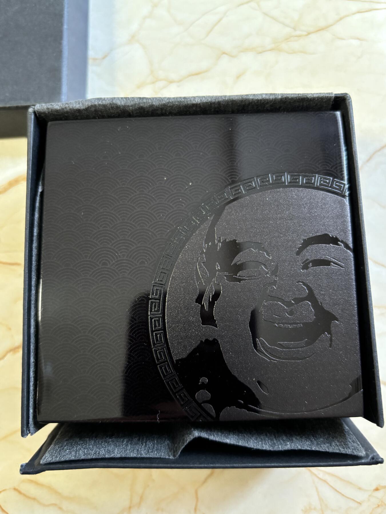 第182期拍卖 帕劳2017年弥勒佛高浮雕镀金2盎司黑色纪念银币，999银，发行888枚