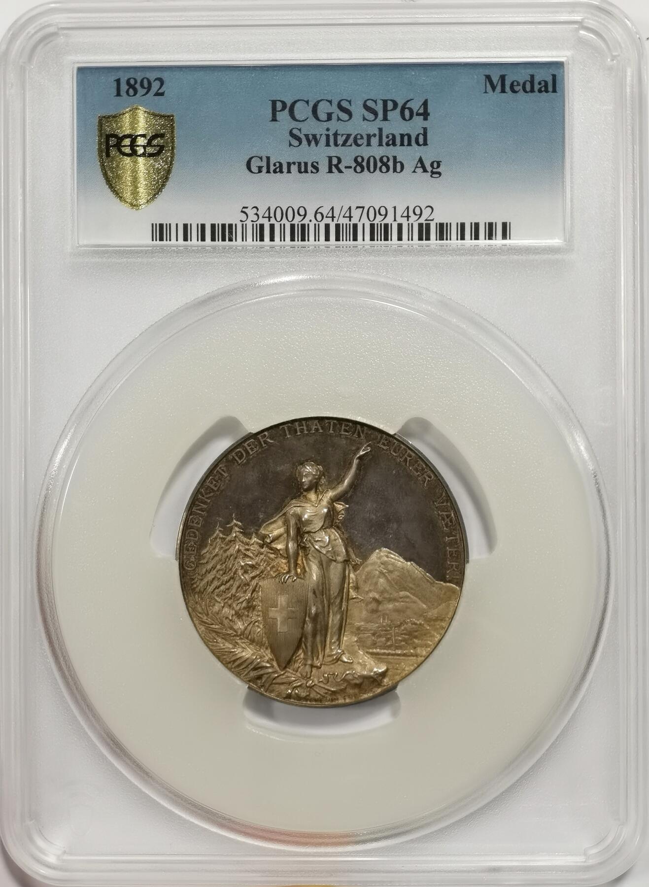 博洋堂世界钱币拍卖第147期（全场包邮） PCGS SP64 瑞士1892年射击节大银章，原味灰彩包浆，整体高浮雕打制，状态一流，值得收藏。