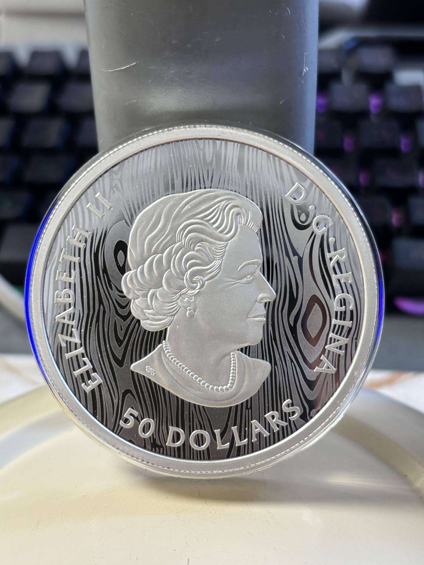 第182期拍卖 加拿大2021年美洲狮多层雕刻立体镂空105.6克纪念银币，9999银，发行1500枚