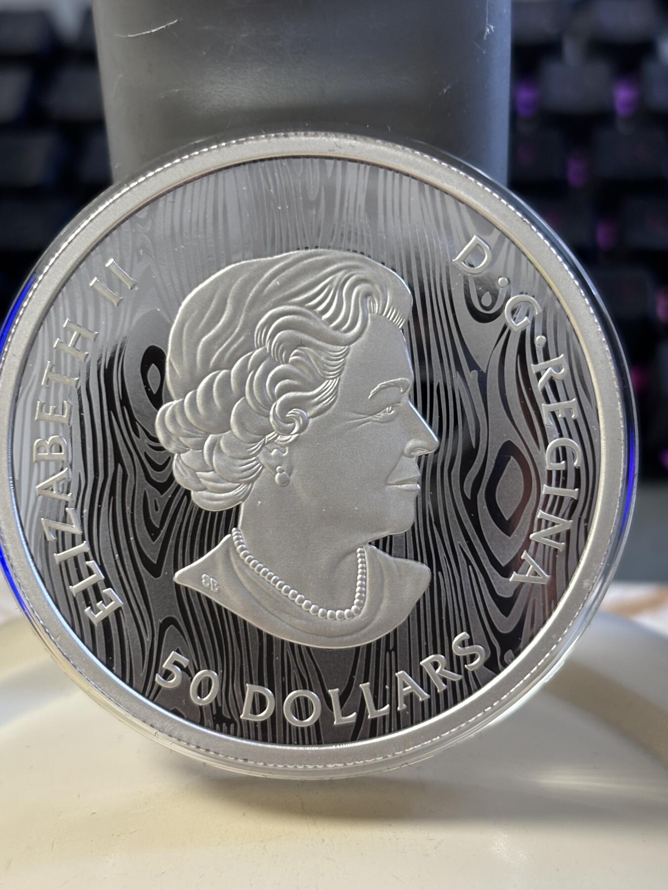 第182期拍卖 加拿大2021年美洲狮多层雕刻立体镂空105.6克纪念银币，9999银，发行1500枚