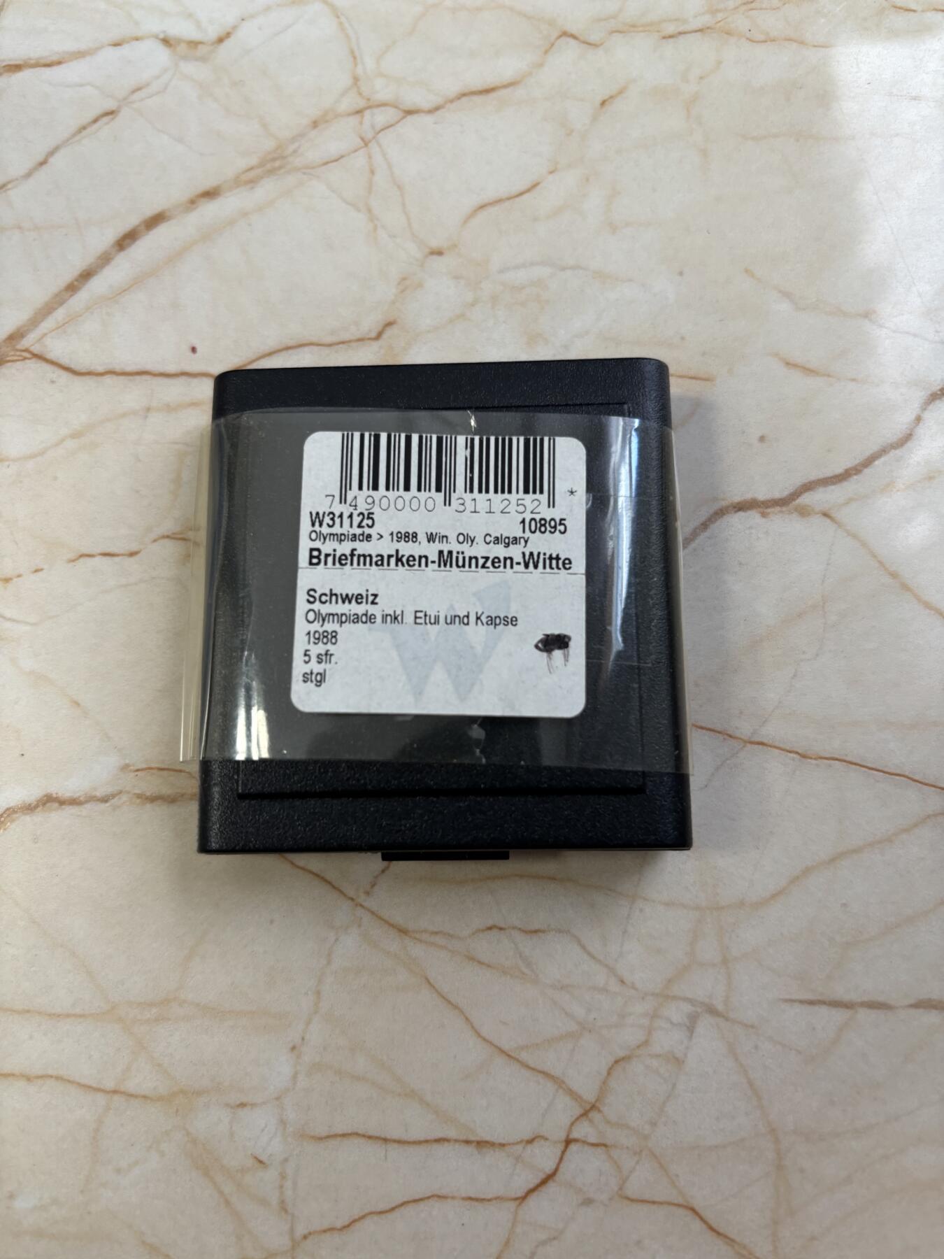 第182期拍卖 获奖瑞士1988年汉城奥运和平鸽和五环铜镍精制版本纪念币带盒，获克劳斯1990年度最佳艺术币大奖，