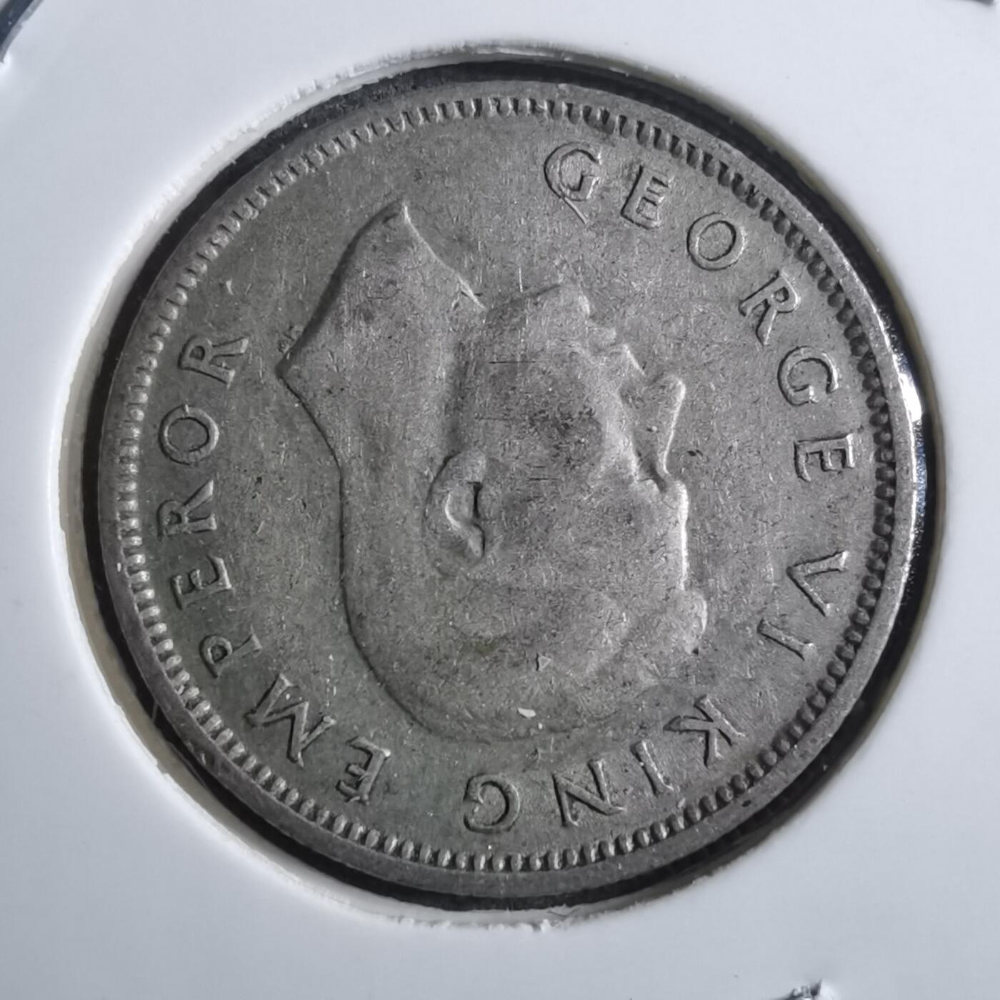 沼泽如烟--第910场 新西兰1943年6便士银币