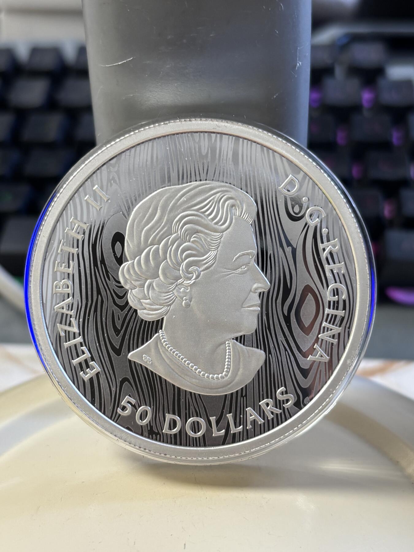 第182期拍卖 加拿大2021年美洲狮多层雕刻立体镂空105.6克纪念银币，9999银，发行1500枚