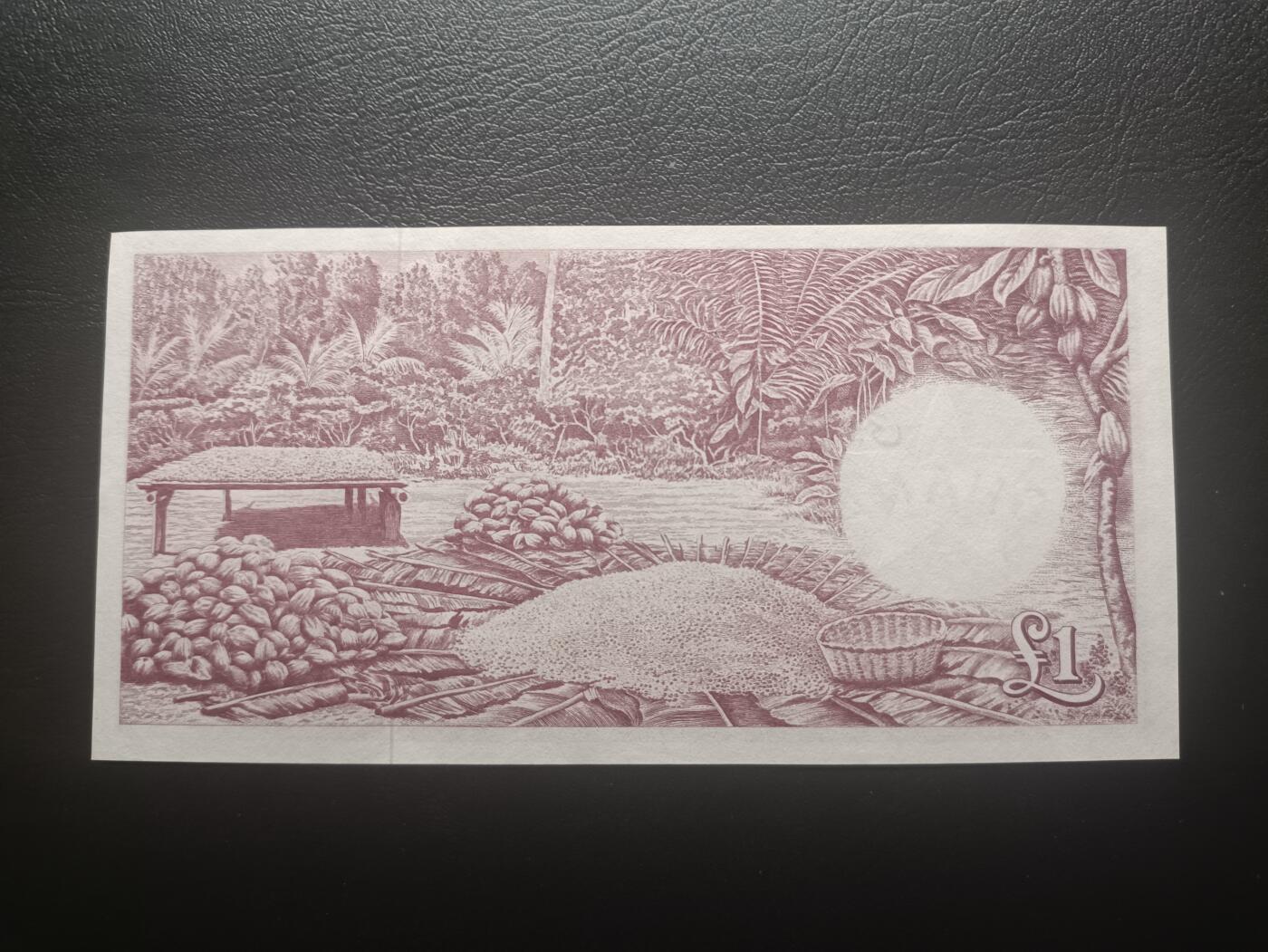 2025十一月第五期，总第203期 加纳1962年1镑UNC-无47，央行大楼和收获可可豆